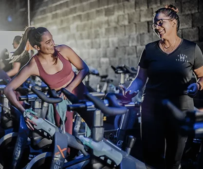 Coach showing static bike